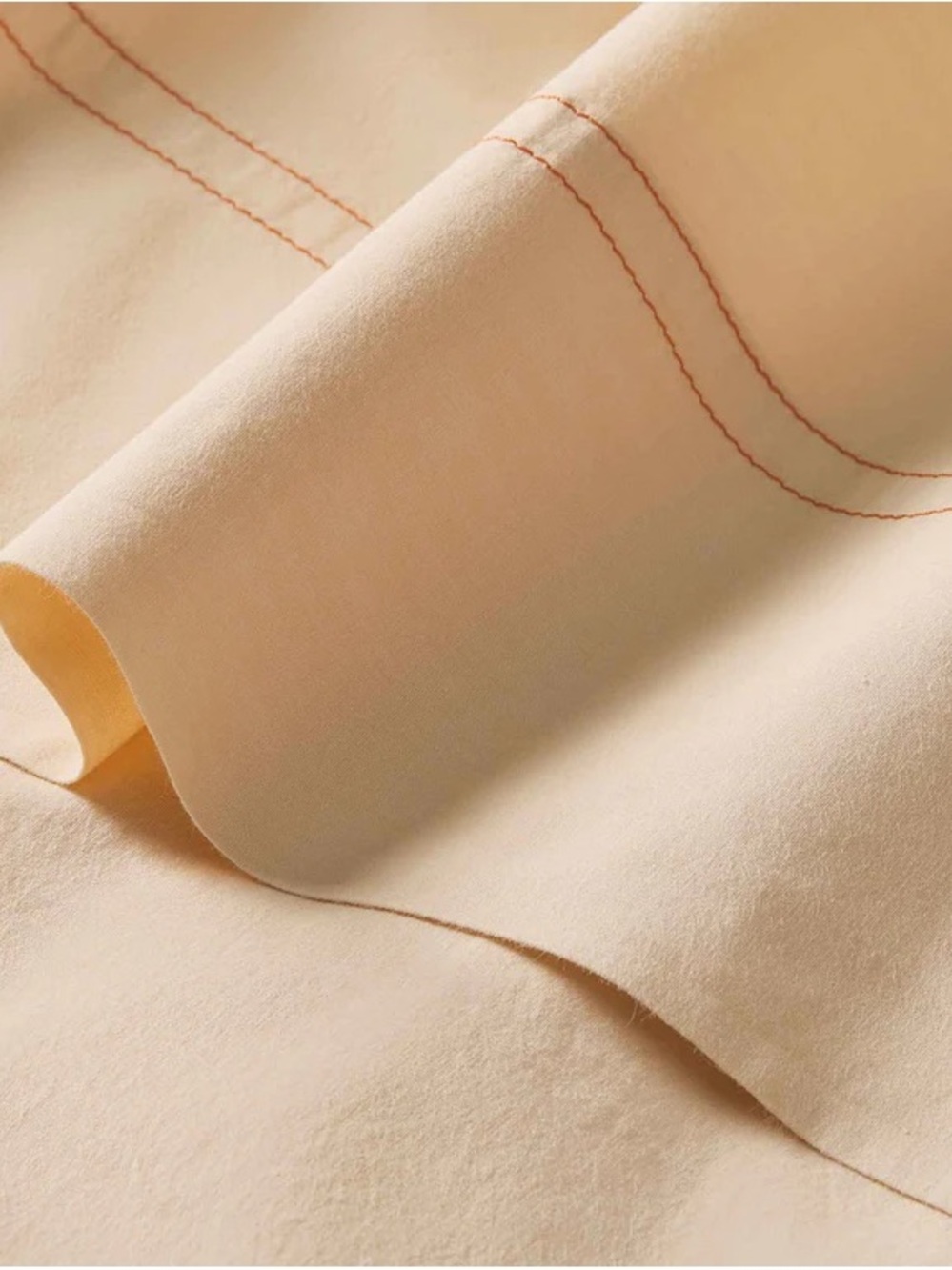 Brooklinen Washed Classic Percale Pillowcase Set - Apricot Chambray - Picture 4 of 4